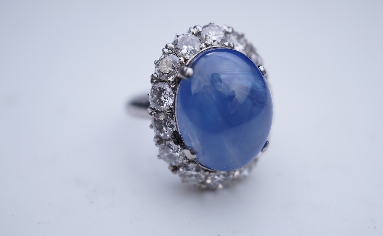 A sapphire and diamond ring, mid 20th century